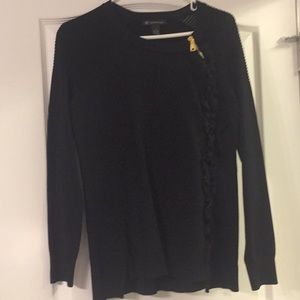 Black sweater with gold zipper